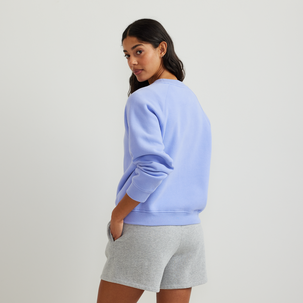 Women's long-sleeve crew sweatshirt with ribbed trims and raglan sleeves