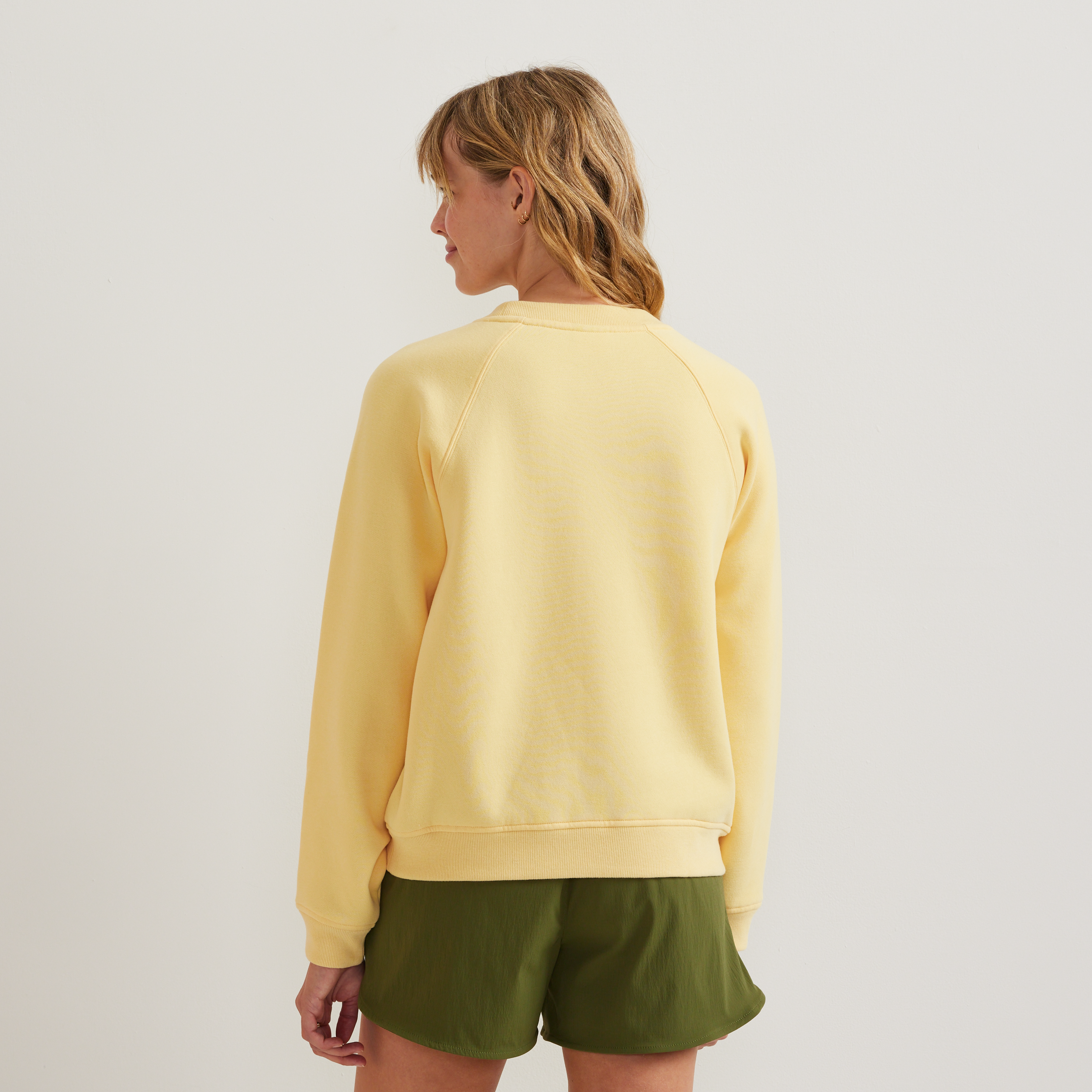 Women's long-sleeve crew sweatshirt with ribbed trims and raglan sleeves
