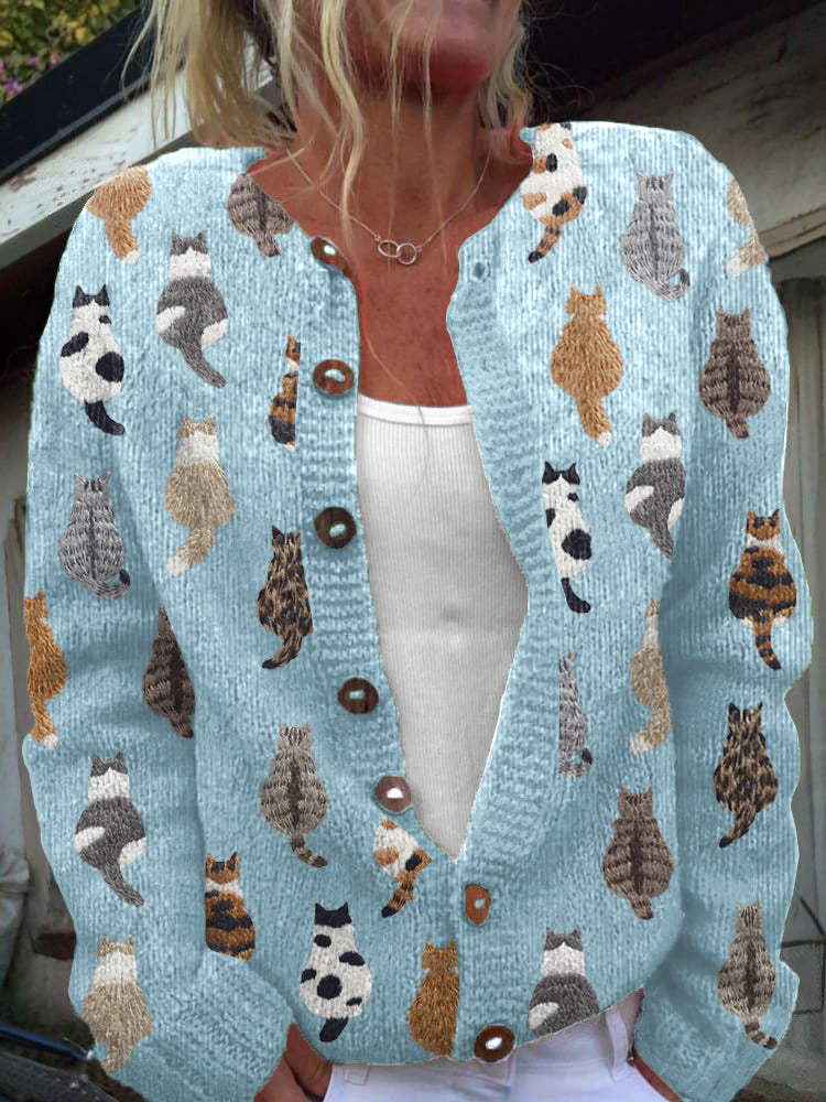 Women's cardigan with an all-over cat pattern, buttons and long sleeves