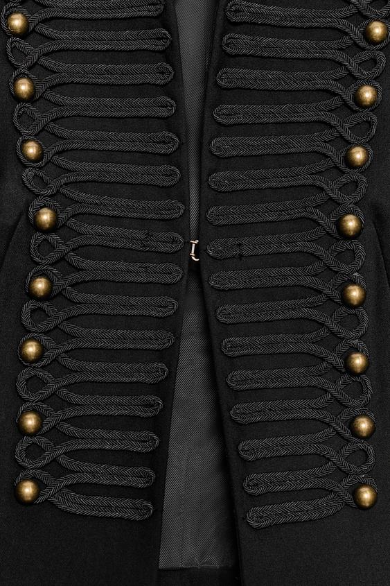 Women's cropped jacket with mandarin collar, decorative front trim and metallic studs