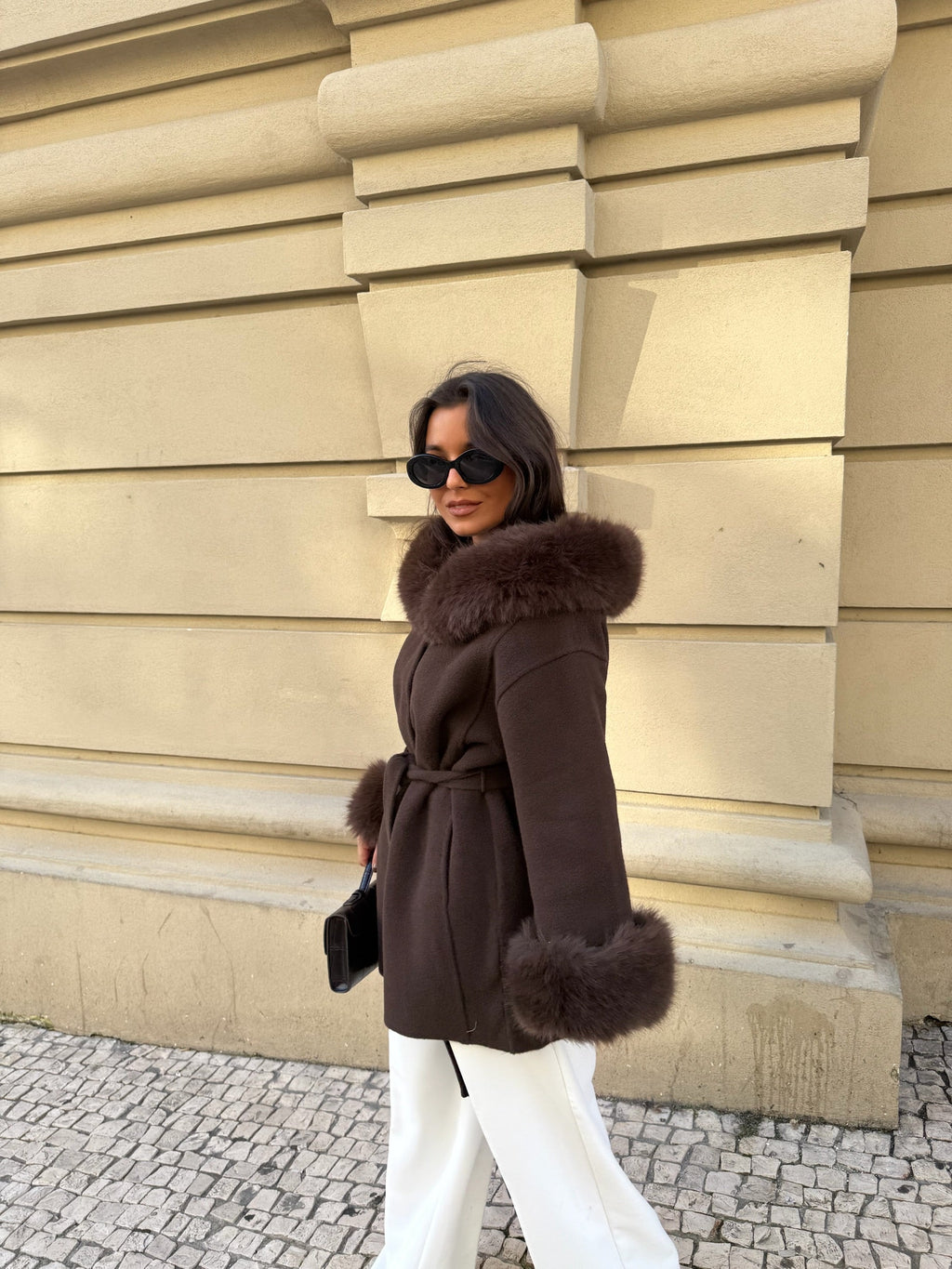 Women's brown wrap coat with wide textured collar and cuff trim