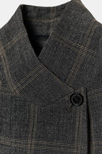 Women's dark checked blazer with high collar, long sleeves and flap pockets