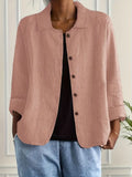 Women's button-front collared cardigan with long sleeves and rounded hem