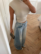 Women's light blue high-waisted wide leg jeans with darker side panels