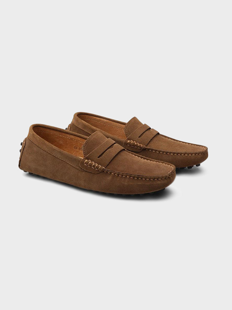 Suede boat loafers with moc toe stitching and slip-on strap detail