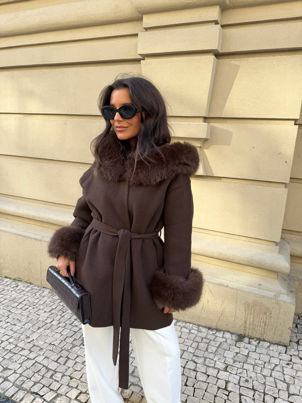 Women's brown wrap coat with wide textured collar and cuff trim