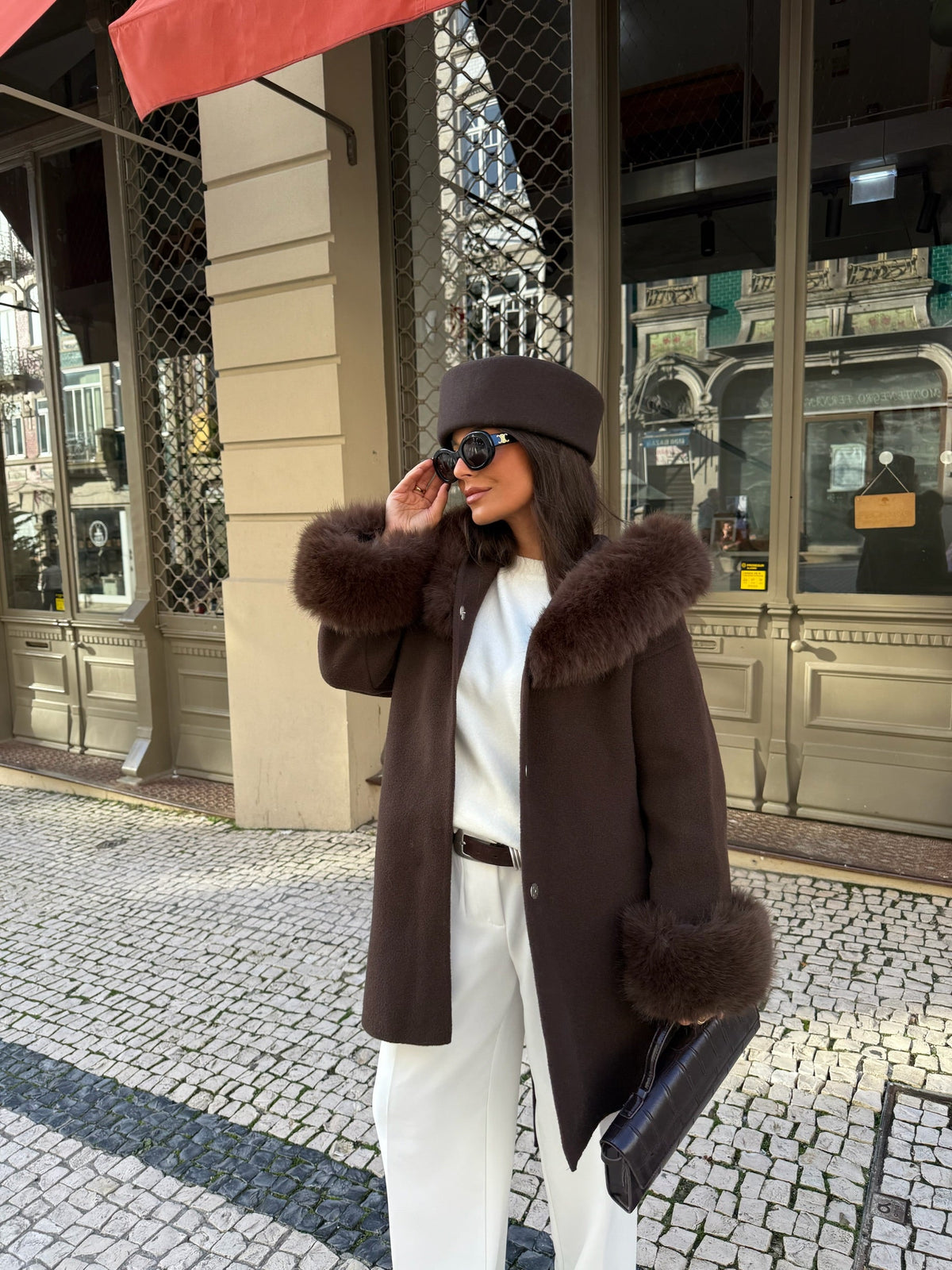 Women's brown wrap coat with wide textured collar and cuff trim