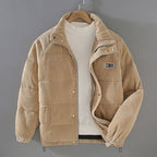 Men's corduroy padded jacket with high collar, zip front and quilted panels