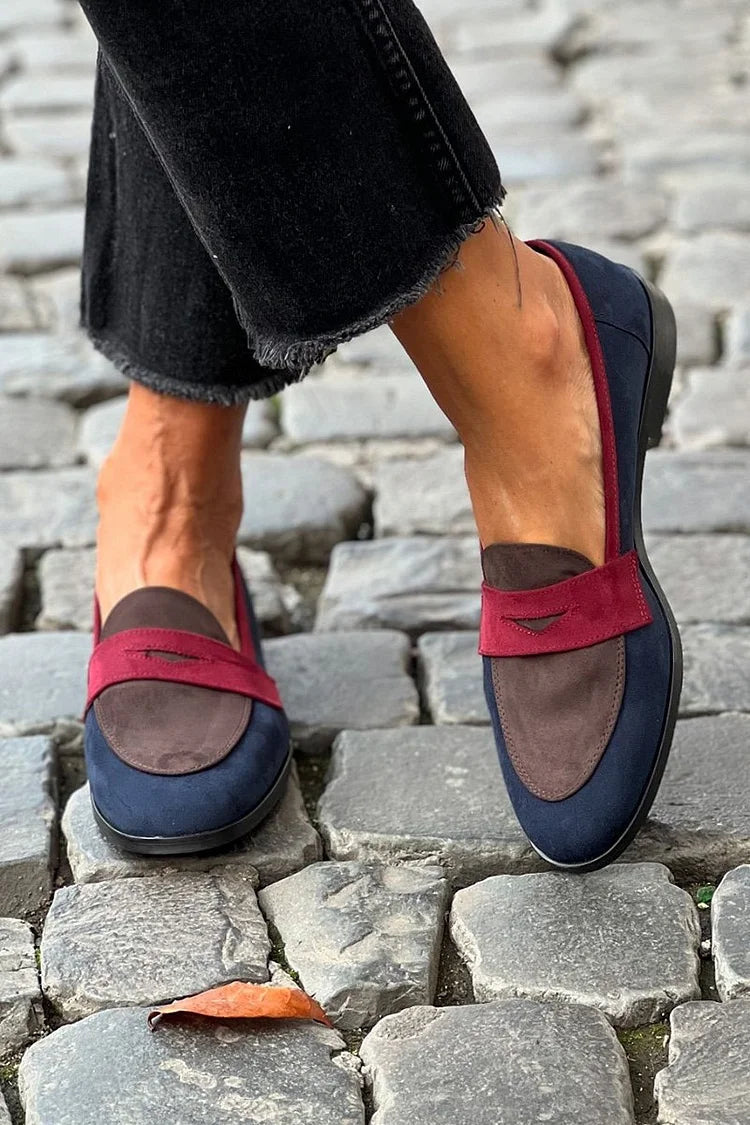 Women's blue round-toe loafers with burgundy straps and low heels