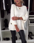 Women's knitted jumper with round neckline, three-quarter sleeves and button cuffs