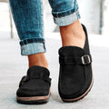 Women's moc toe loafers with buckle straps and flat textured soles