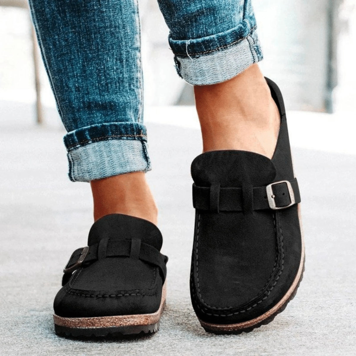Women's moc toe loafers with buckle straps and flat textured soles