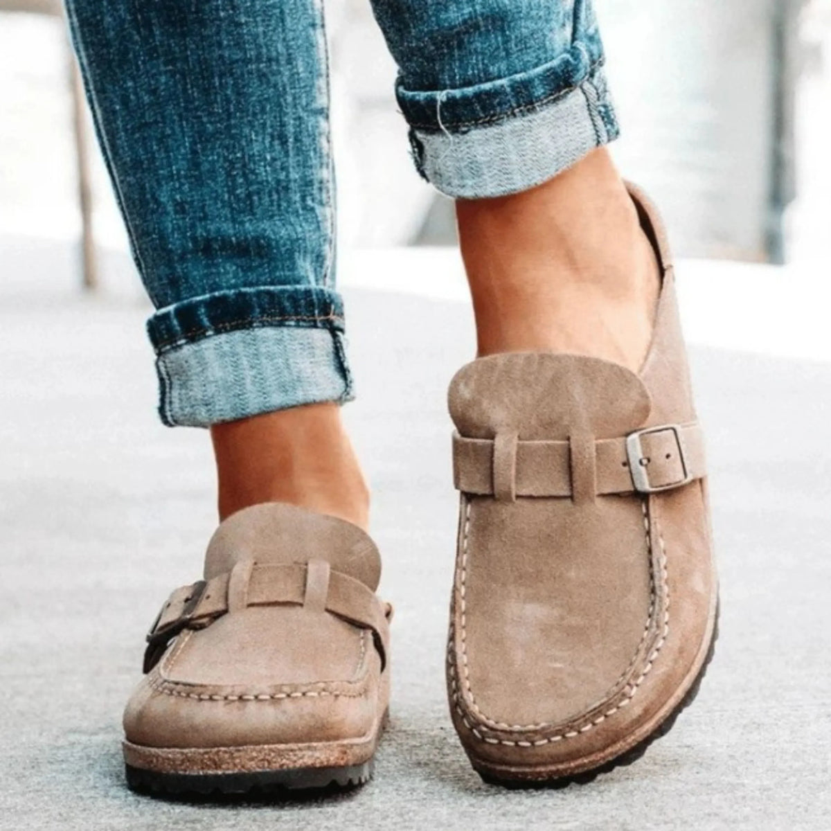 Women's moc toe loafers with buckle straps and flat textured soles