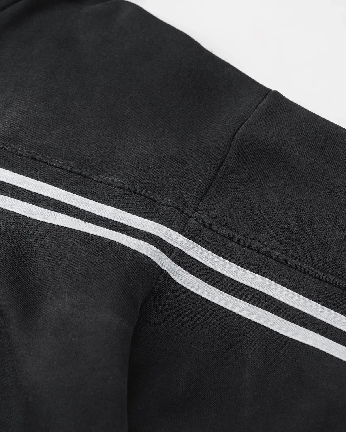 Black men's hooded zip-up hoodie with contrasting chest and sleeve stripes