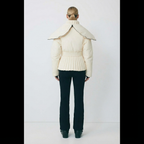 Women's hooded quilted ski jacket with belted waist and long sleeves