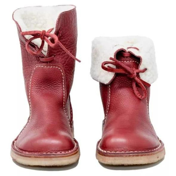 Lace-up mid-calf boots with round toes, stitched panels and flat soles