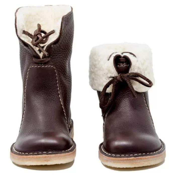 Lace-up mid-calf boots with round toes, stitched panels and flat soles