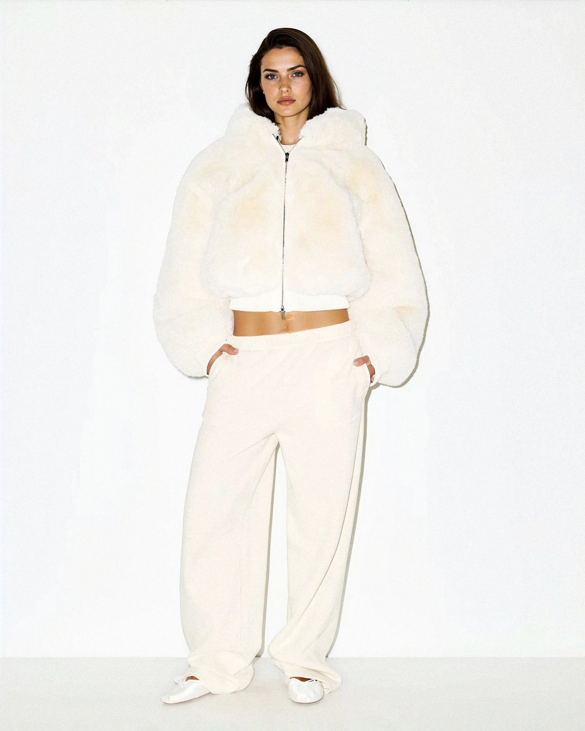 Women's cropped faux fur jacket with hood and zip front