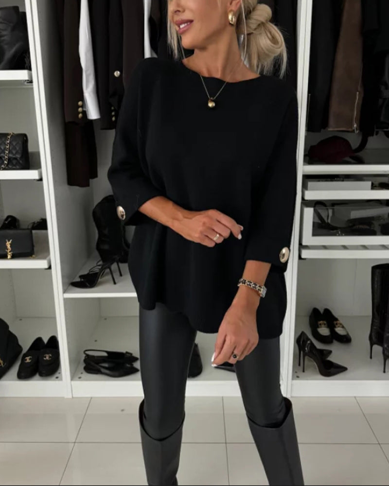 Women's knitted jumper with round neckline, three-quarter sleeves and button cuffs