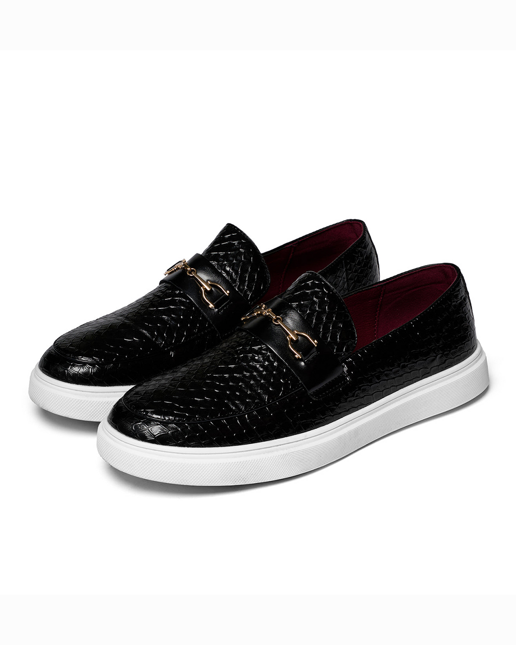Embossed slip-on loafers with metal bit details and white platform soles