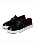 Embossed slip-on loafers with metal bit details and white platform soles