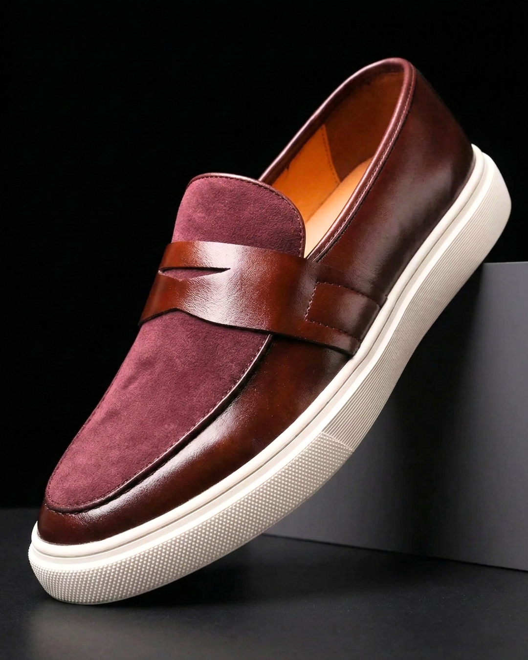 Men's penny strap slip-on loafer with almond toe and textured sole