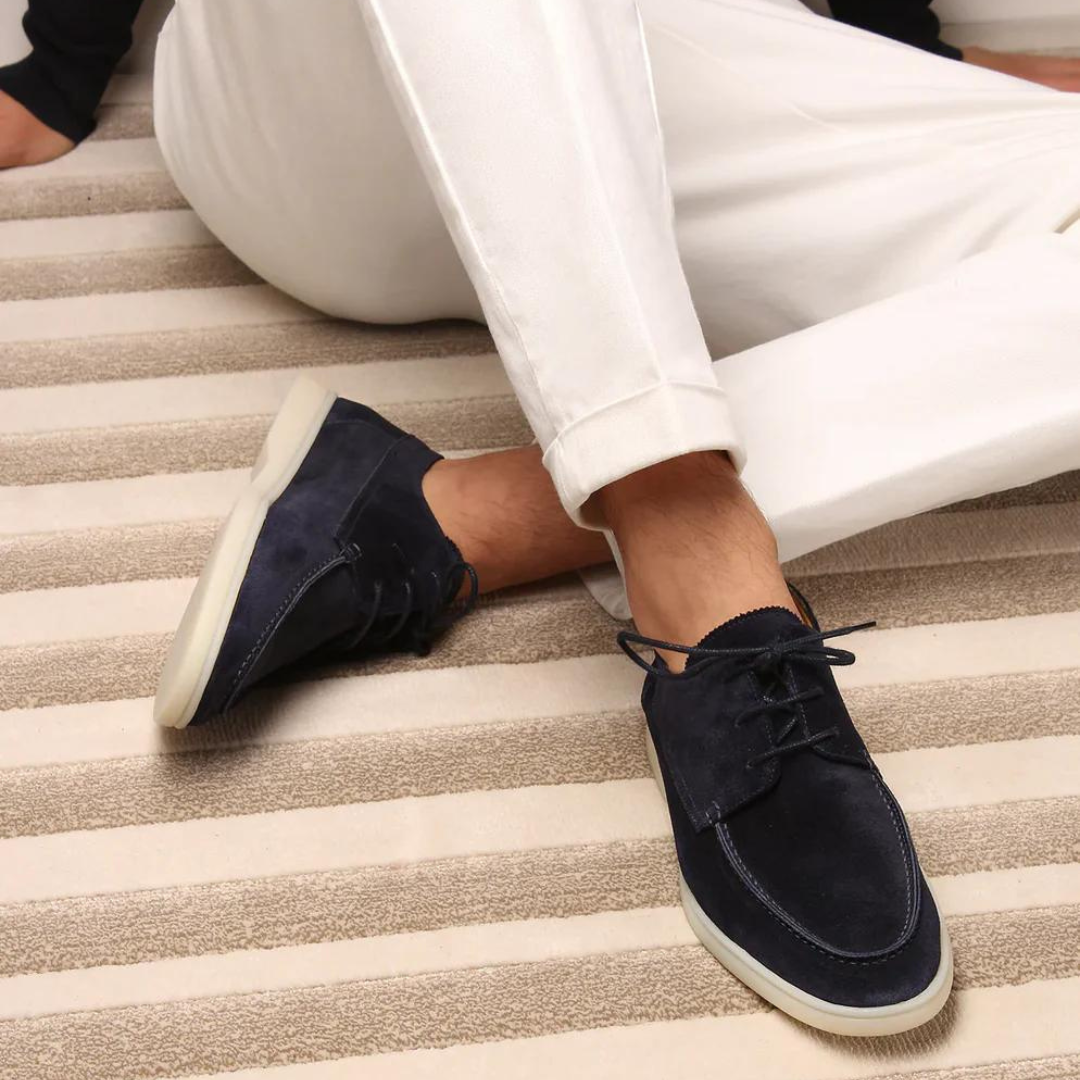 Men's lace-up moccasin shoes with rounded stitched toe and flat light sole