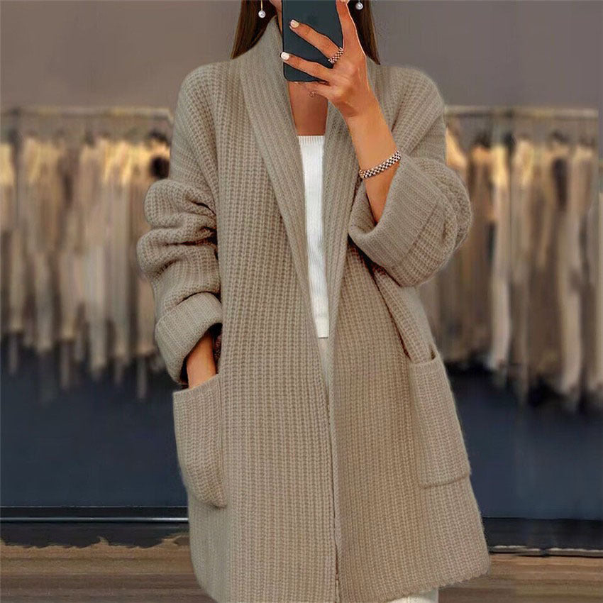 Women's longline textured knitted cardigan with open front, long sleeves and two front pockets