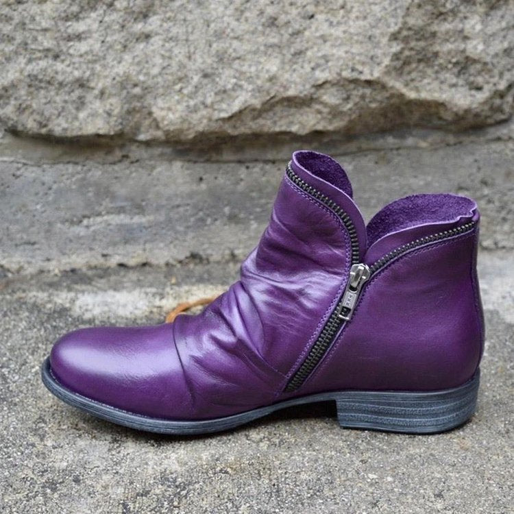 Women's ankle boots with side zips, ruched detailing and low heels