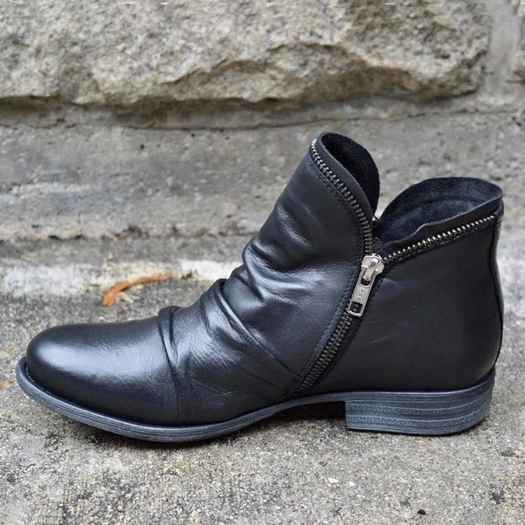 Women's ankle boots with side zips, ruched detailing and low heels