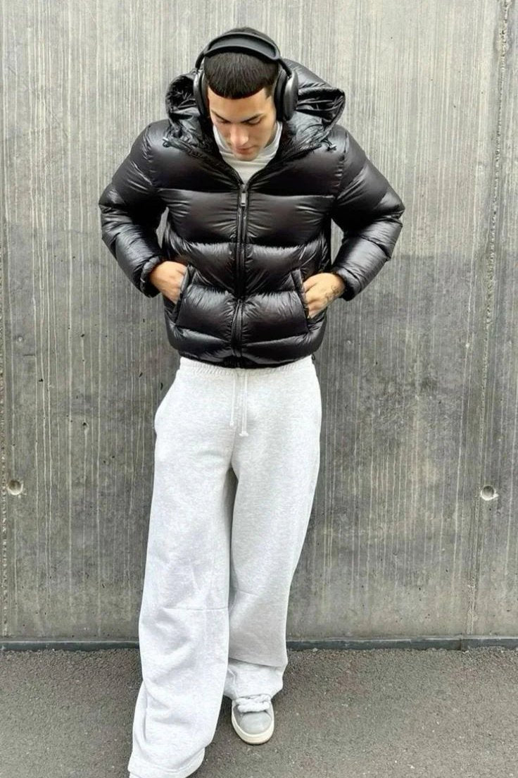 Men's hooded quilted puffer jacket with zip front and angled pockets