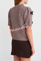 Women's taupe knitted crop top with dark bow details and short sleeves