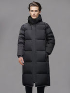 Men's black long hooded puffer coat with quilted panels and front pockets