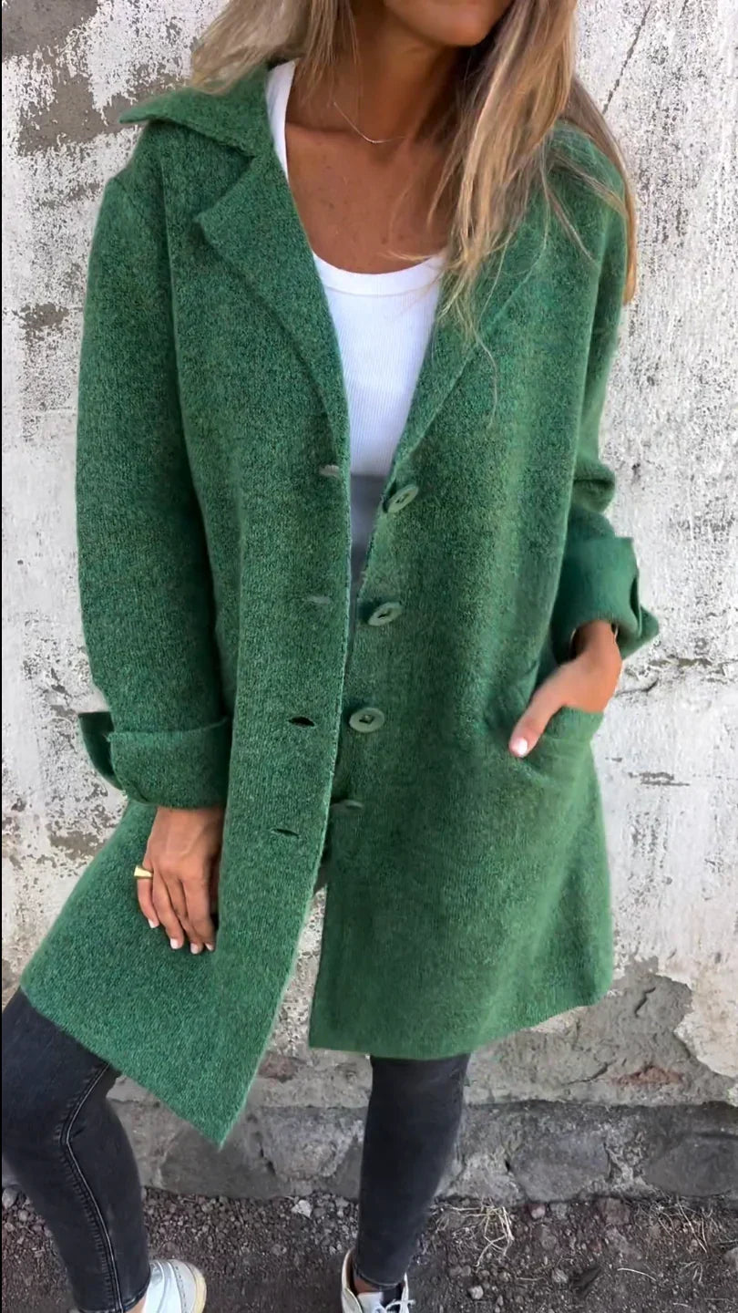 Women's longline button front coat with notched lapels and long sleeves