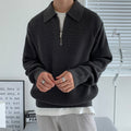 Men's ribbed quarter-zip sweater with collared neckline and long sleeves