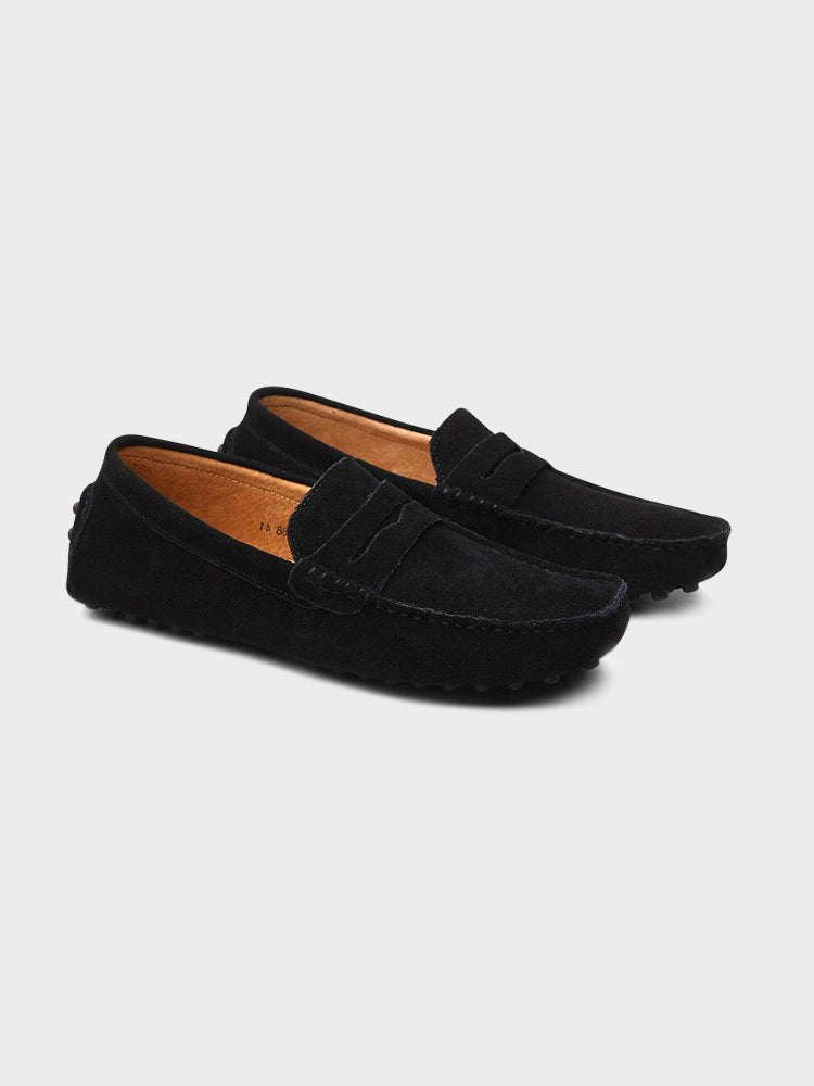 Suede boat loafers with moc toe stitching and slip-on strap detail