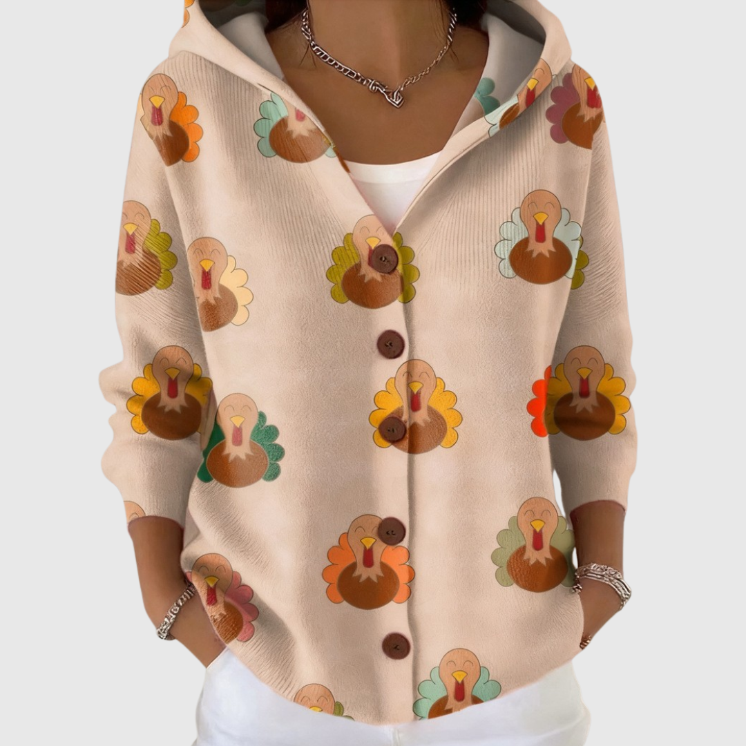 Women's beige hooded knitted cardigan with colourful turkey print and brown buttons