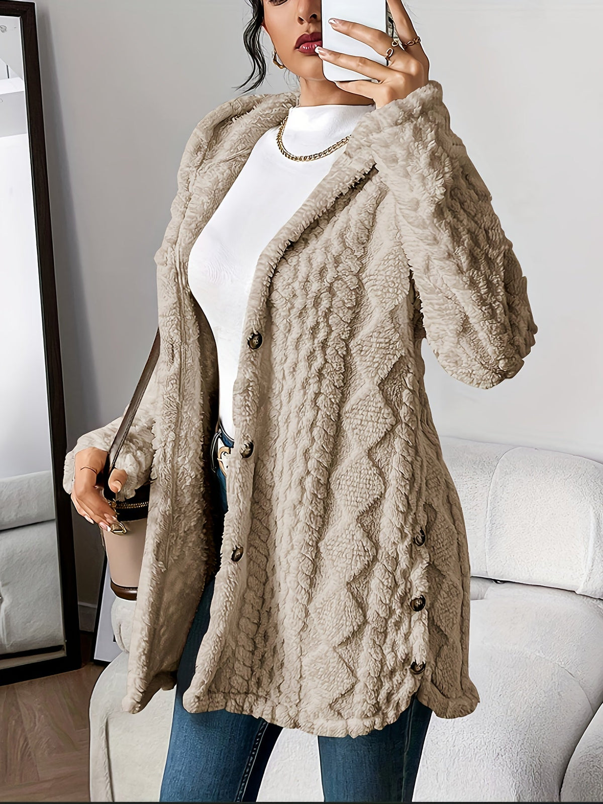 Women's hooded textured cardigan with long sleeves, button front and side pockets