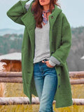 Women's longline hooded coat with button front and striped turn-back cuffs
