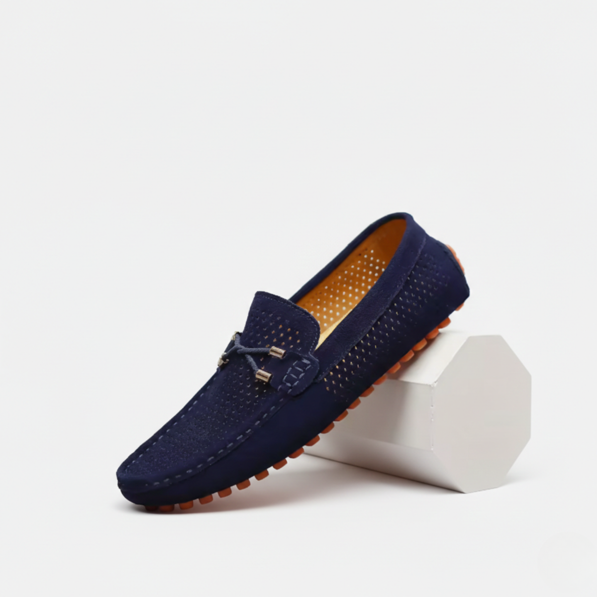 Men's perforated slip-on loafers with moc toe and metallic front detail