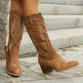 Women's knee-high western boots with embroidered detailing, pointed toes and block heels