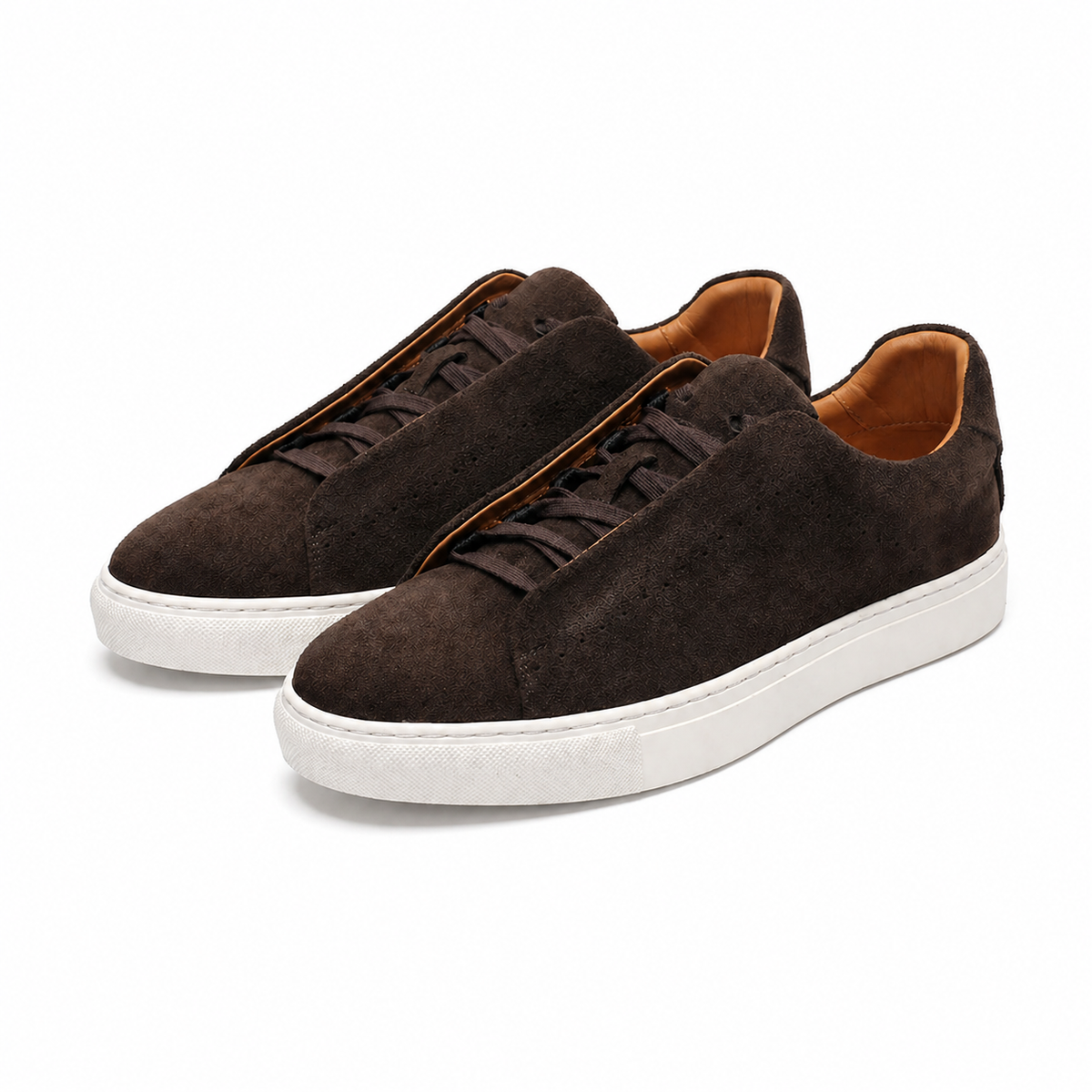 Low-top lace-up trainer with perforated side detailing and contrasting white sole