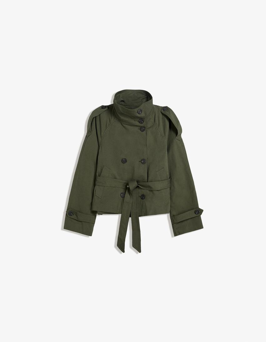 Women's cropped trench jacket with high collar, buttons, belt and shoulder tabs