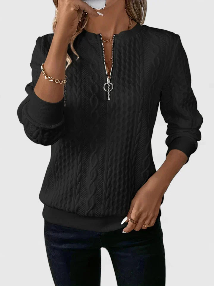 Women's textured cable knit quarter-zip sweater with long sleeves and ribbed trims