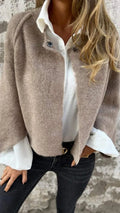 Women's short coat with round neckline, long sleeves and button detail