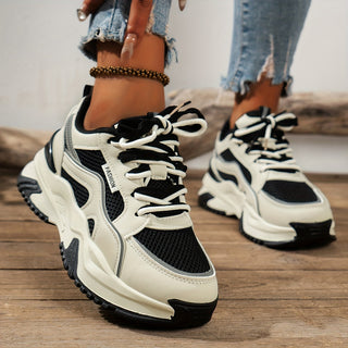 Women's chunky lace-up trainers with raised soles and panelled uppers