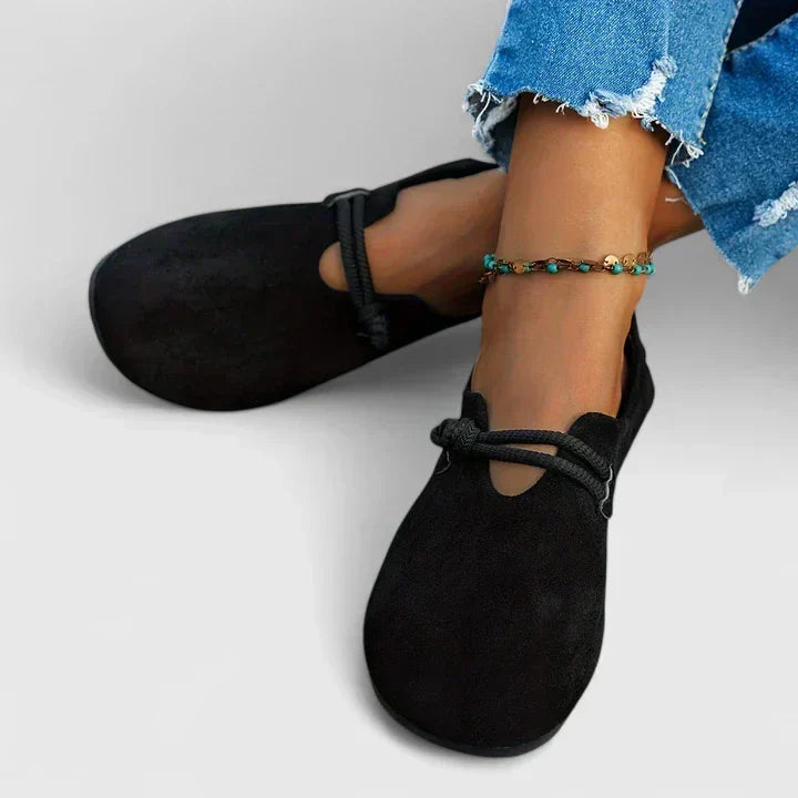 Women's slip-on loafers with rounded toes, rope trim and flat soles