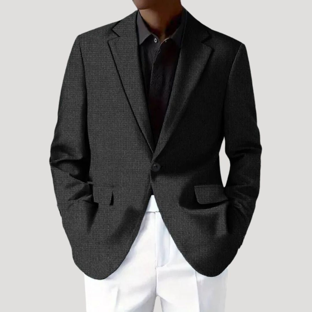 Men's textured blazer with notched lapels, button front and flap pockets