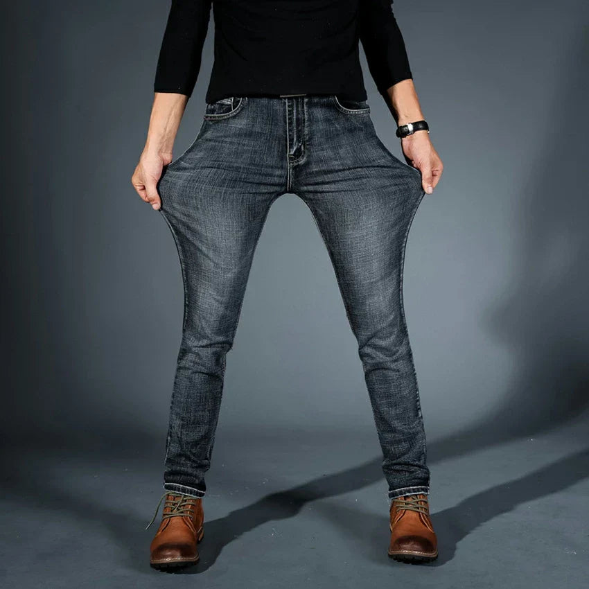 Men's slim fit jeans with five-pocket design and tapered legs