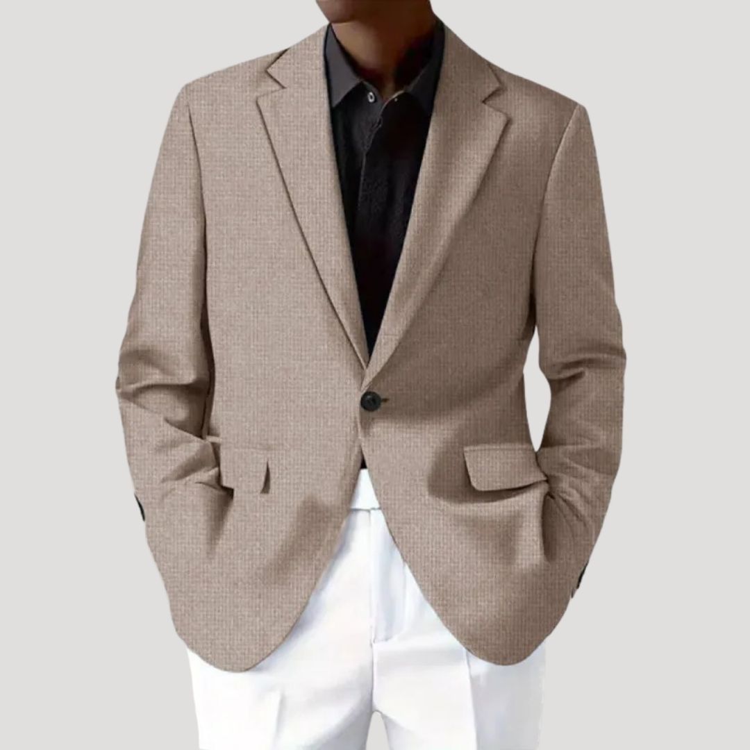 Men's textured blazer with notched lapels, button front and flap pockets